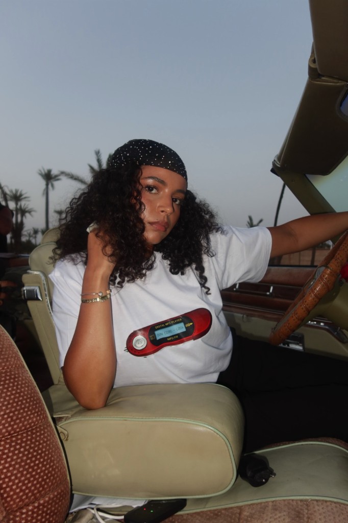 White tee in the driver’s seat